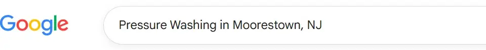 Google Search bar with query 'Pressure Washing in Moorestown, NJ' for local service SEO optimization