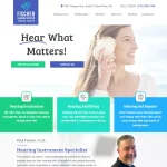 Fischer Hearing Center homepage hero banner featuring hearing loss solutions with call-to-action buttons and service cards.